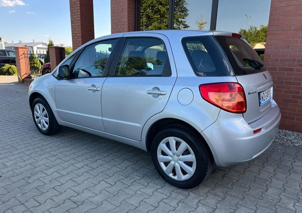 Suzuki SX4 cena 26900 przebieg: 153000, rok produkcji 2012 z Borne Sulinowo małe 254